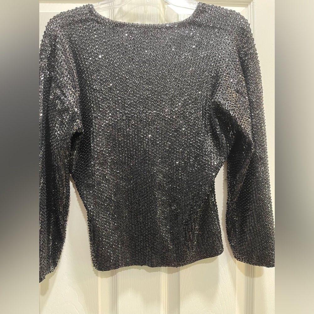 Vintage sequin top. Soft silk inside.